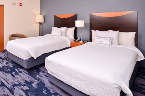 Premium bedding, pillowtop beds, desk, blackout drapes