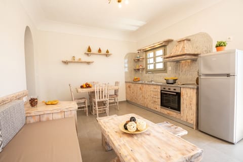 Villa | Private kitchen | Full-size fridge, oven, stovetop, coffee/tea maker