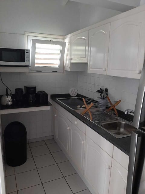 Standard Apartment, 2 Bedrooms | Private kitchen | Full-size fridge, microwave, stovetop, coffee/tea maker