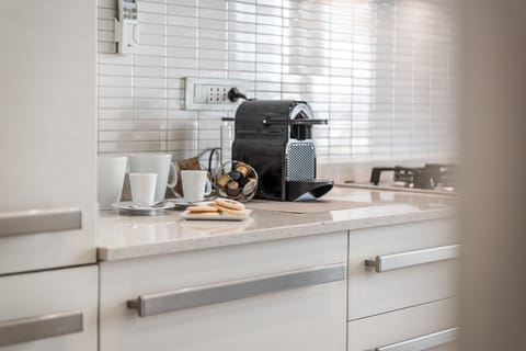 Apartment, 3 Bedrooms | Private kitchen | Full-size fridge, oven, stovetop, dishwasher