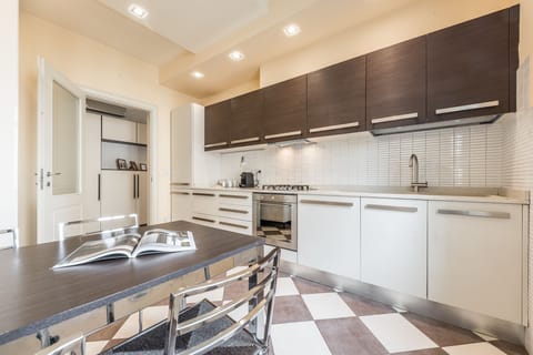 Apartment, 3 Bedrooms | Private kitchen | Full-size fridge, oven, stovetop, dishwasher