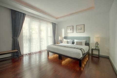 Deluxe Pool View Double Room | Free minibar items, in-room safe, blackout drapes, soundproofing