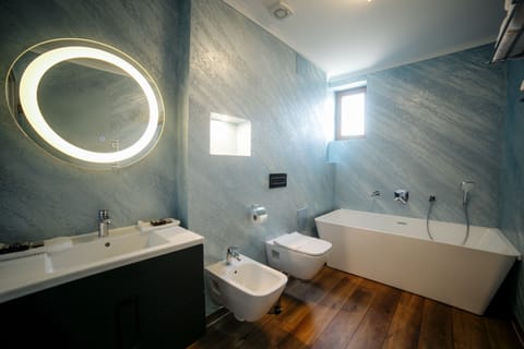 Standard Apartment | Bathroom | Hair dryer, towels