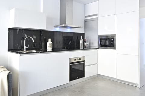 Penthouse, 2 Bedrooms, Balcony | Private kitchen | Full-size fridge, microwave, oven, stovetop