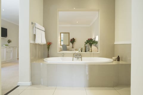 Superior Room, 1 King Bed | Bathroom | Separate tub and shower, deep soaking tub, designer toiletries