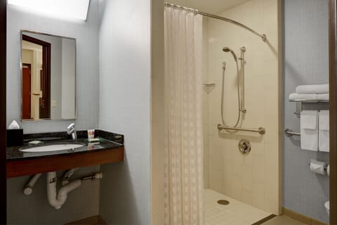 Room, 1 King Bed, Accessible (Shower) | Bathroom | Designer toiletries, hair dryer, towels, soap