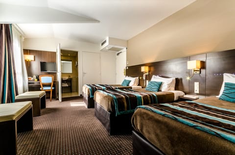 Triple Room | Select Comfort beds, in-room safe, desk, blackout drapes