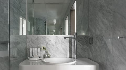 Superior Room | Bathroom | Rainfall showerhead, designer toiletries, hair dryer, bathrobes