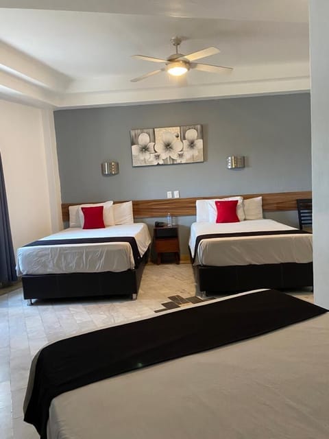 Standard Room, Multiple Beds | Desk, free WiFi, bed sheets