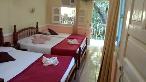 Family Triple Room, 1 Bedroom, Balcony, Garden View (Orquidea) | Hypo-allergenic bedding, down comforters, minibar, in-room safe