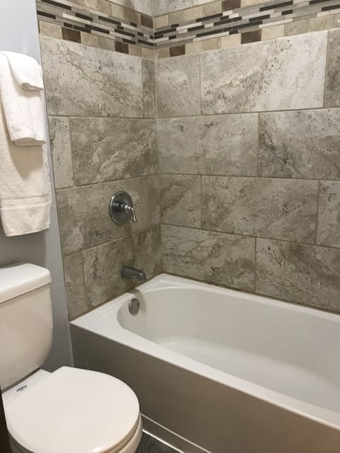 Standard Double Room | Bathroom | Combined shower/tub, hair dryer, towels, soap