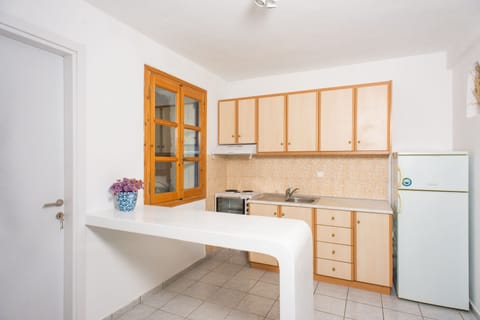 Deluxe Apartment, Sea View | Private kitchenette | Fridge, coffee/tea maker, electric kettle, cookware/dishes/utensils