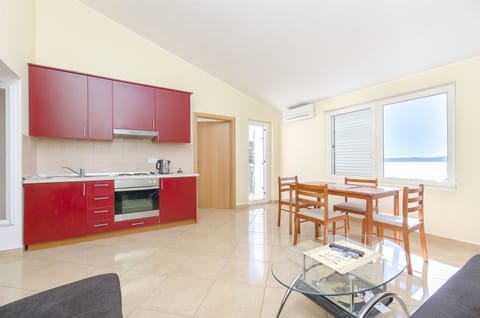 Apartment (A4) | Private kitchen | Fridge, stovetop, electric kettle