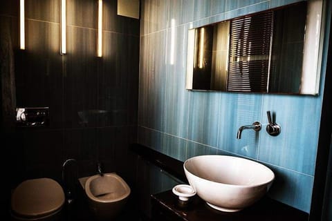 Quadruple Room | Bathroom | Shower, towels