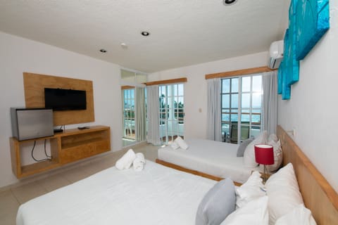 Deluxe Room, 2 Double Beds, Partial Ocean View | 1 bedroom, iron/ironing board, free WiFi, bed sheets