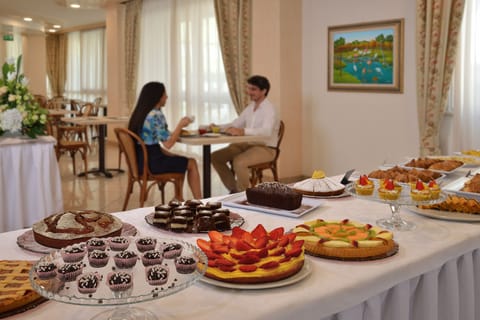 Daily buffet breakfast (EUR 15 per person)