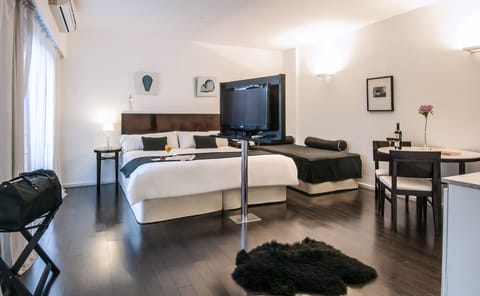 Deluxe Triple Room | Premium bedding, down comforters, pillowtop beds, minibar