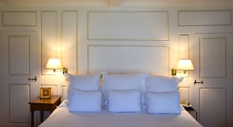 Charming White Room Boutique B&B | Frette Italian sheets, premium bedding, down comforters