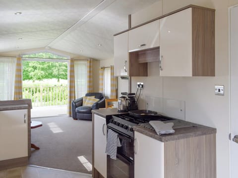 Kitchen area of the open-plan living space | Bridge End Lodge, Dollar, near Stirling