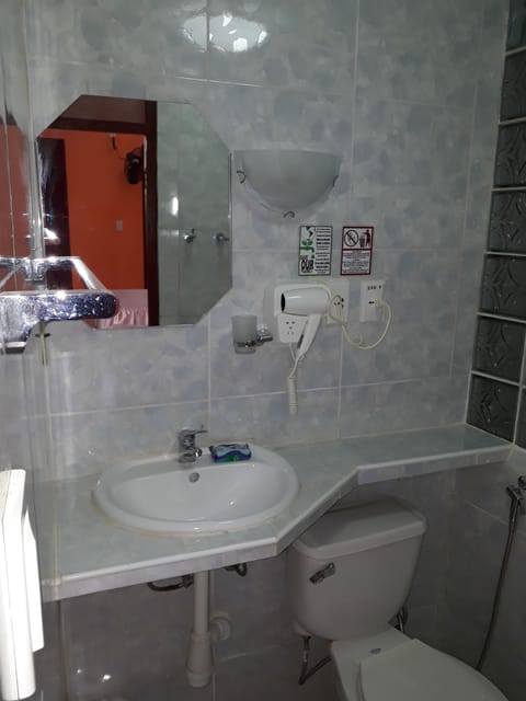 Family Double Room, Courtyard View | Bathroom | Shower, rainfall showerhead, free toiletries, hair dryer