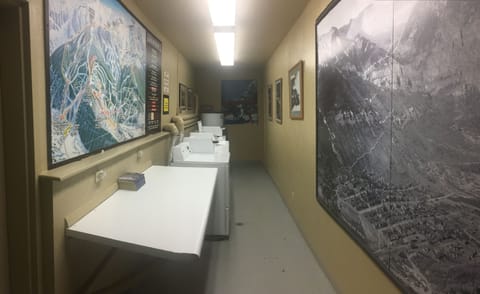 Laundromat on property - approx 30 feet from entry stairs.