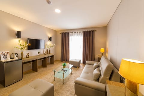 Tarsier Suite | Living area | 43-inch TV with cable channels