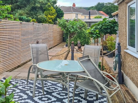Outdoor dining area | Sonny Cottage, Garnant, near Ammanford