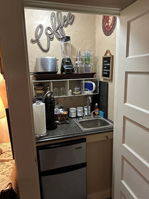 kureg coffee pot,coffee condiments, frig,tea pot,blender,toaster,wine glasses