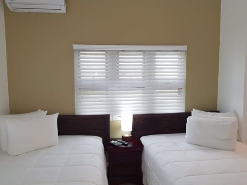 Comfort Room, 2 Double Beds, Kitchenette | Individually decorated, individually furnished, iron/ironing board