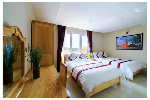 Deluxe Quadruple Room, City View | 1 bedroom, minibar, soundproofing, free WiFi