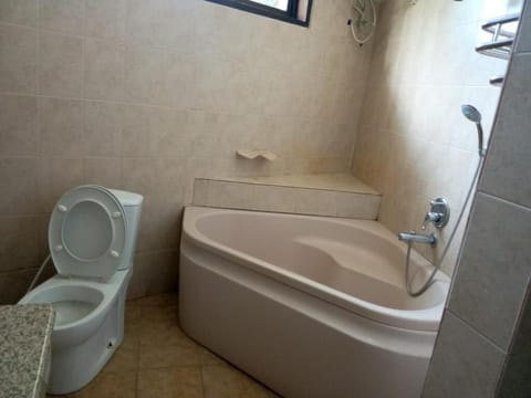 Separate tub and shower, free toiletries, slippers, towels