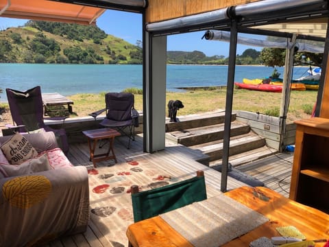 Blinds open up for indoor - outdoor flow. Also shaded area when too hot