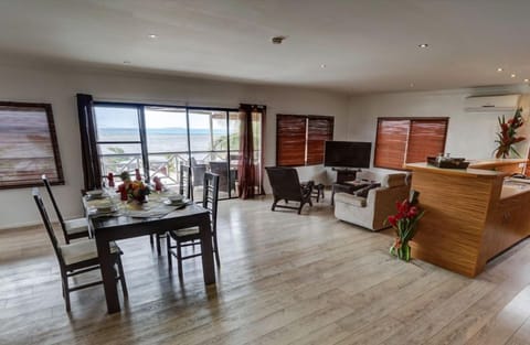 Luxury Suite, 2 Bedrooms, Balcony, Sea View | Living area | Flat-screen TV
