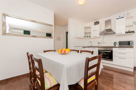 Apartment (A1) | Private kitchen | Fridge, microwave, oven, stovetop