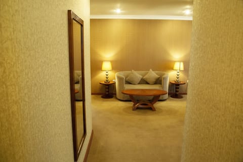 Superior Room | Living area | Flat-screen TV