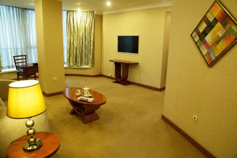 Superior Room | Living area | Flat-screen TV