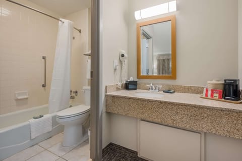 Combined shower/tub, deep soaking tub, free toiletries, hair dryer