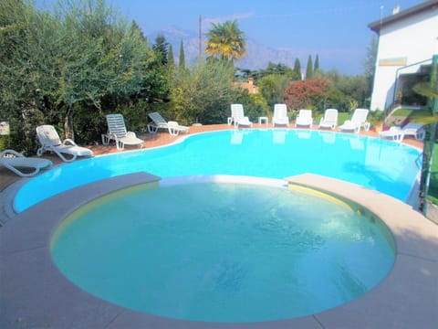 Seasonal outdoor pool, pool umbrellas, sun loungers