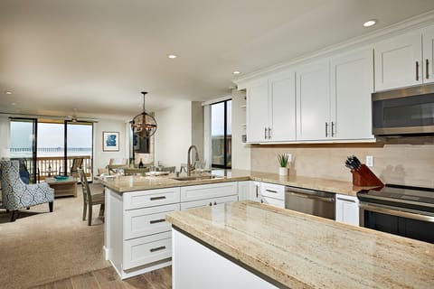 The island kitchen has a great ocean view!