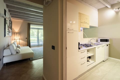 JUNIOR SUITE CHARME | Living area | Flat-screen TV