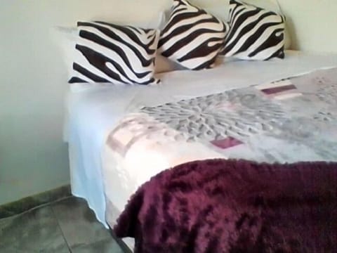 Comfort Room, Shared Bathroom | Desk, iron/ironing board, free WiFi, bed sheets