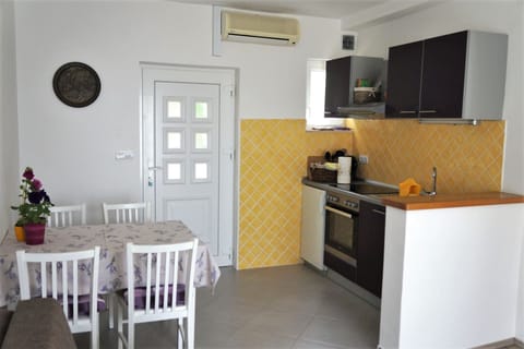 Apartment, Sea View | Private kitchen | Fridge, coffee/tea maker, cookware/dishes/utensils