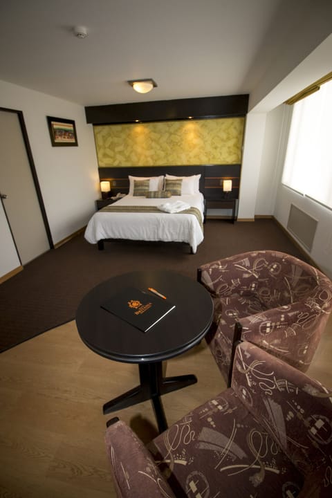 Suite, 1 Queen Bed | Minibar, in-room safe, desk, laptop workspace