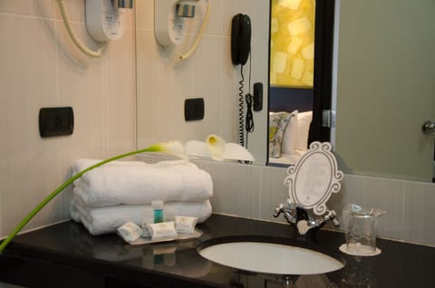 Suite, 1 Queen Bed | Bathroom | Deep soaking tub, free toiletries, hair dryer, towels