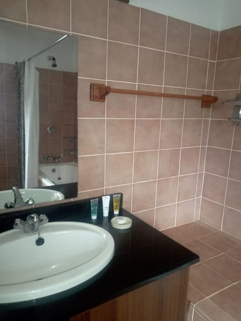 Standard Double or Twin Room | Bathroom | Combined shower/tub, deep soaking tub, free toiletries, bathrobes