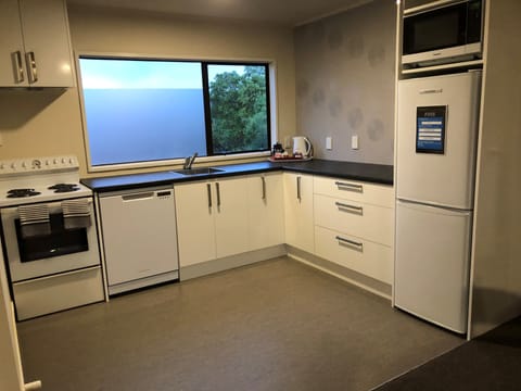 Family Apartment, 2 Bedrooms | Private kitchen | Fridge, microwave, stovetop, dishwasher