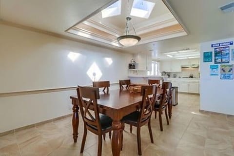 Large Dining Room Area with Table and 6 Chairs