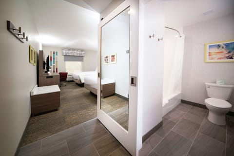 Room, 2 Queen Beds, Refrigerator | Bathroom | Combined shower/tub, free toiletries, hair dryer, towels