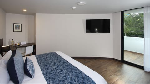 Junior Suite | 1 bedroom, premium bedding, down comforters, minibar