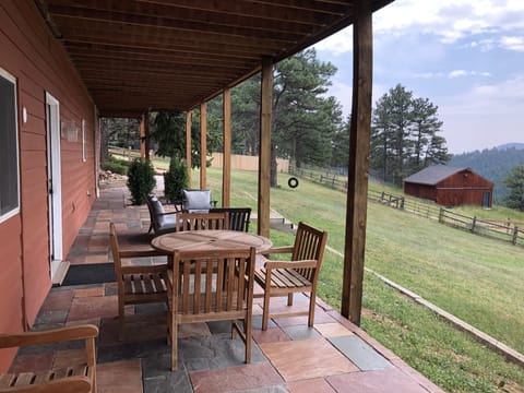 Private, outdoor patio with dining table, BBQ and conversational seating.